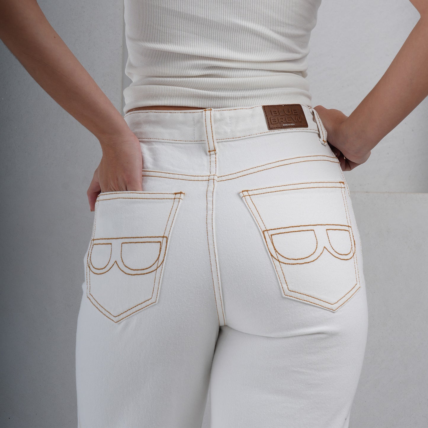 IVORY ASYMMETRIC JEANS